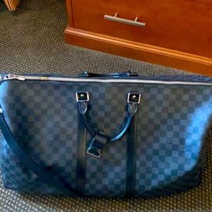 Louis duffel bag used once for business trip